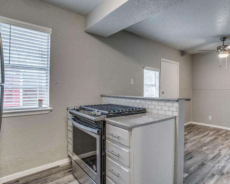 Kitchen with stainless gas range
